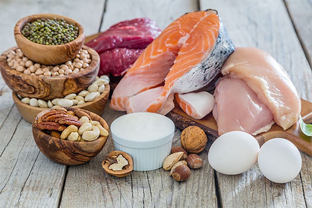 Protein foods like eggs, fish, nuts, beans, and peas.