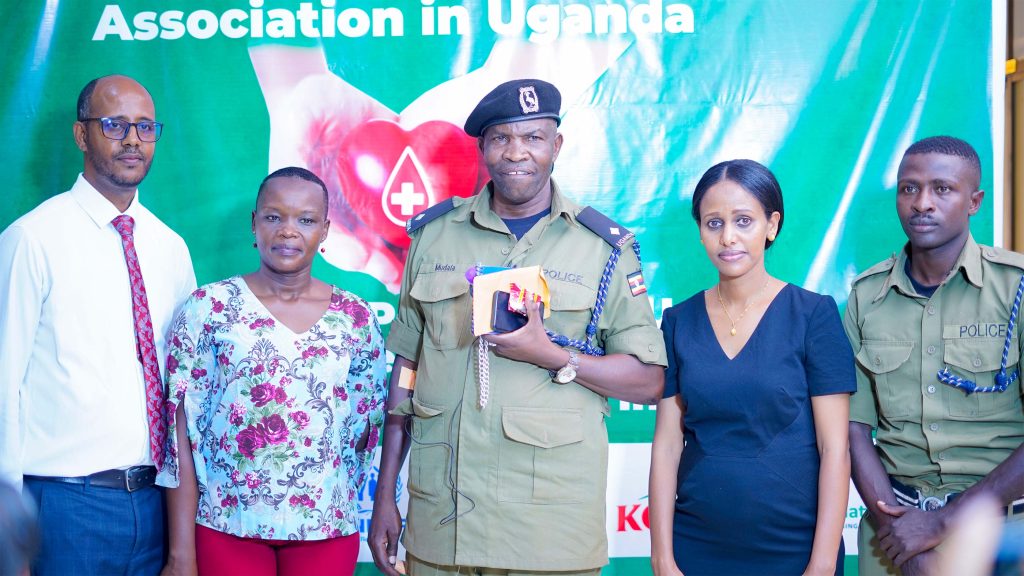 Aliru Stella, the Superintendent of Police, Kabalagala Police Station (SP), and Mr. Bwaise Mudala, Office in Charge (OC), Kawempe Police Station at the Event